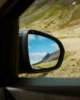 Vistas de los fiordos del oeste desde el retrovisor