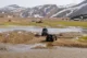 Superjeeps cruzando el río frente al camping de Landmannalaugar