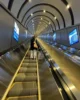 Uno de los 7 tramos de subida de escaleras mecánicas