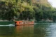 Barco que cruza el río en Xingping